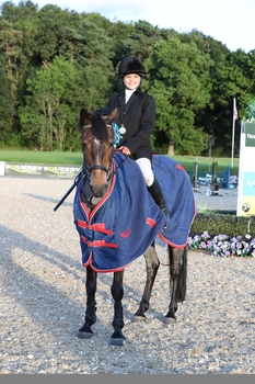 Lucky Lou lives up to her name at the NAF Five Star British Showjumping Championships